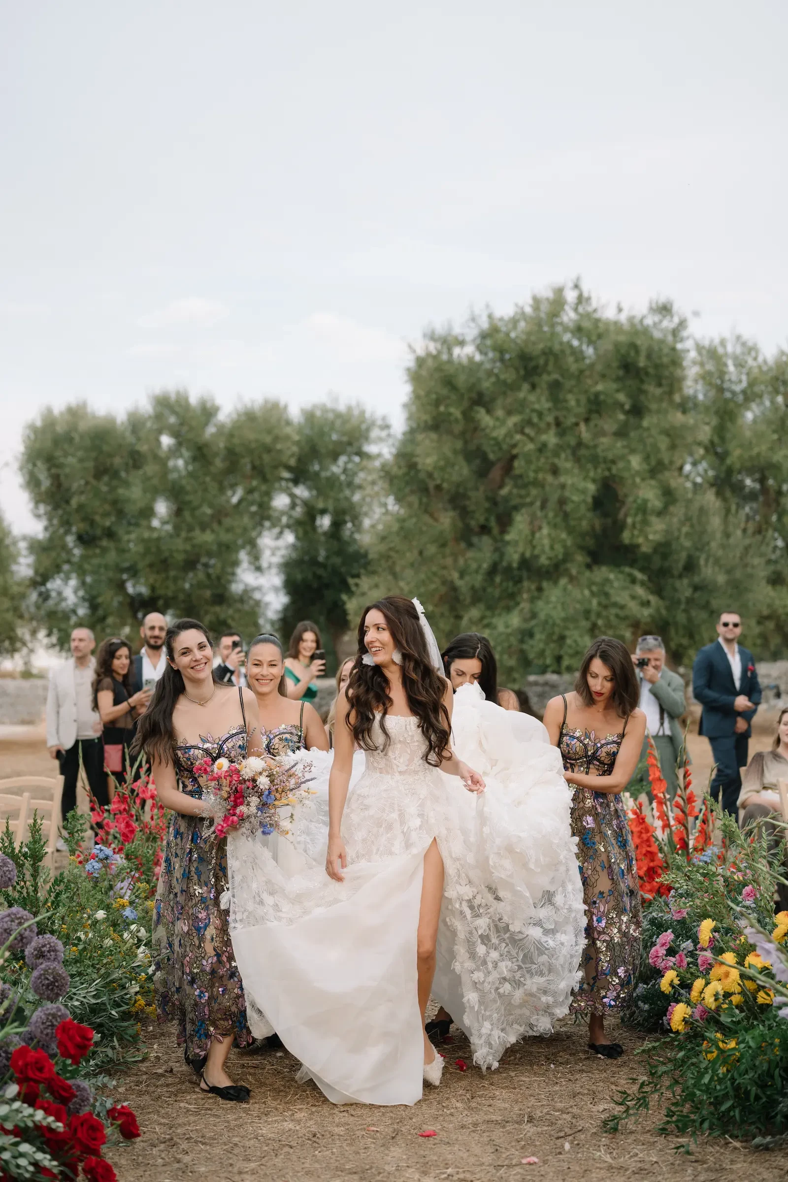 Bride Walking Down Aisle With Bridesmaids