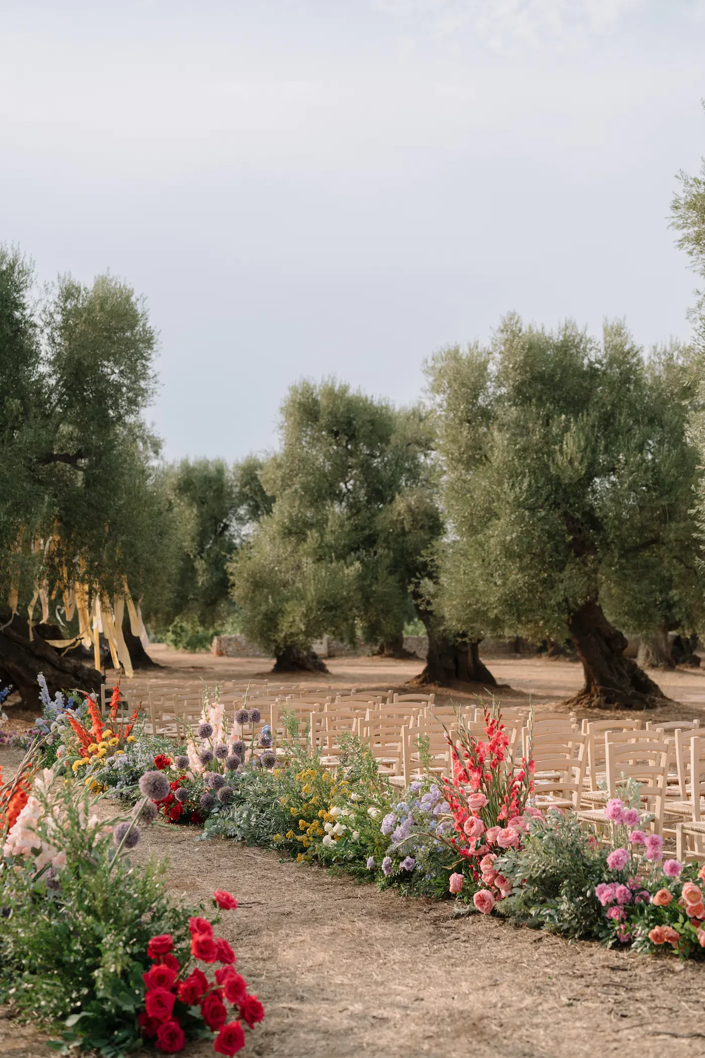 Outdoor Wedding Ceremony Aisle Colorful Floral Arrangements Olive Grove