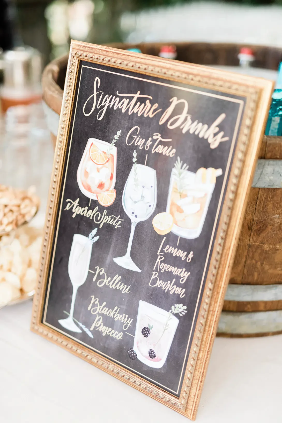 Hand-painted sign for signature drinks
