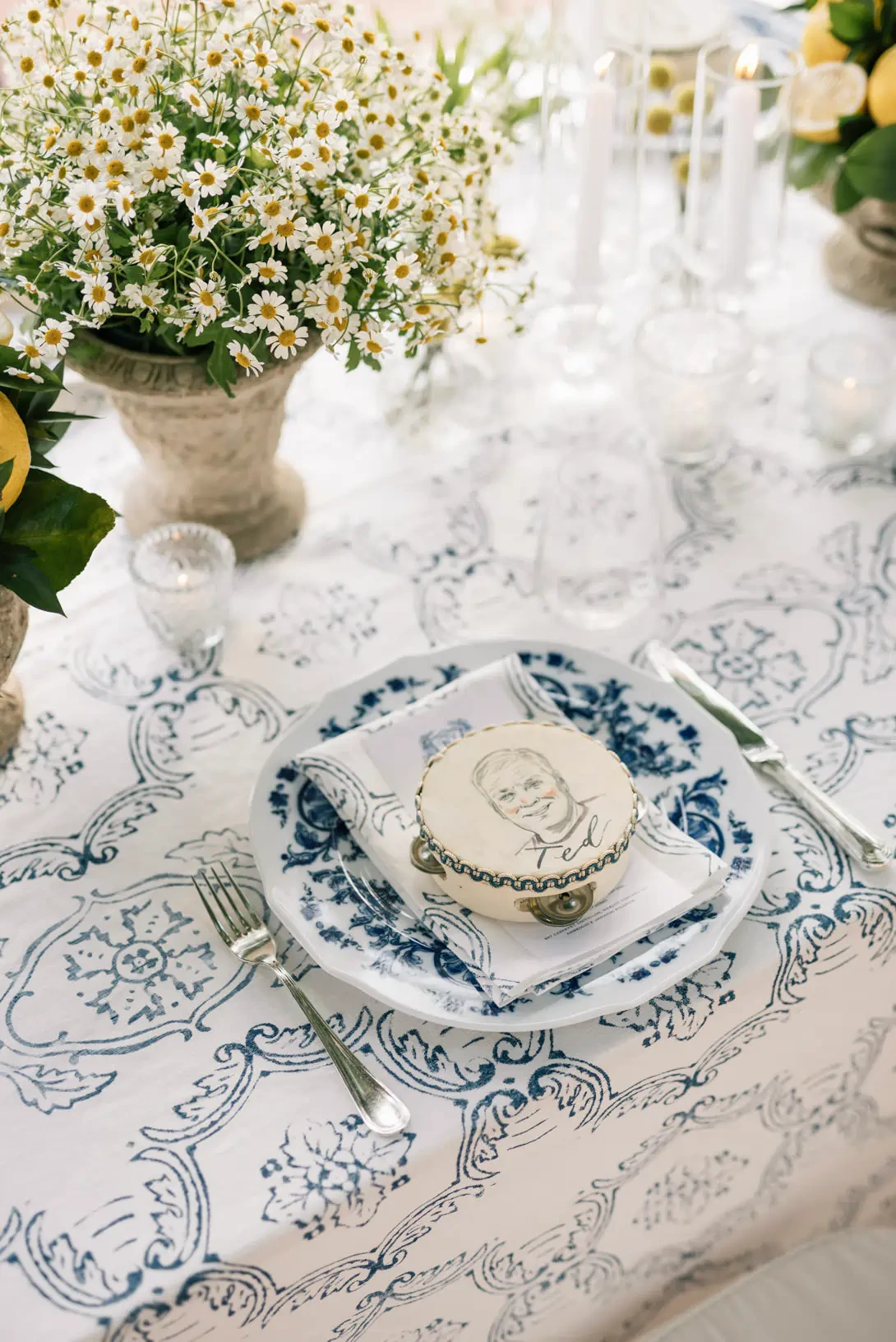 Table setting with painted tambourine