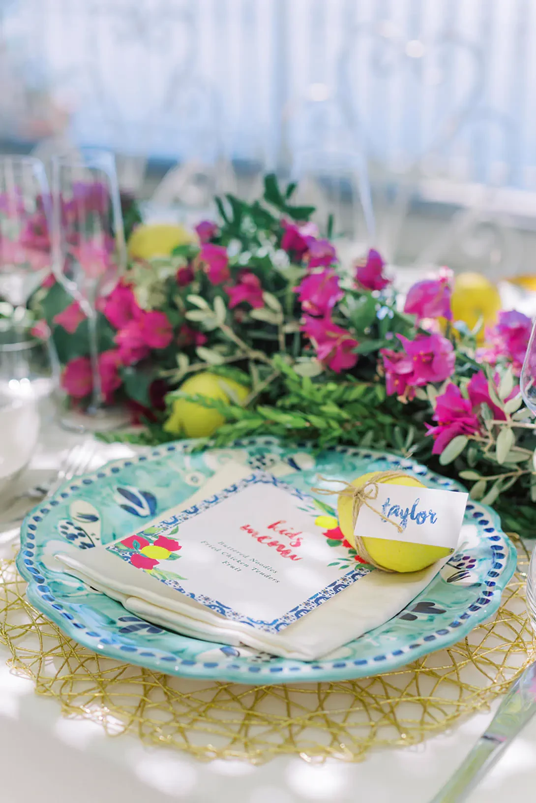 Table setting in pink, yellow and blue